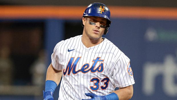 James McCann runs the bases for the Mets.